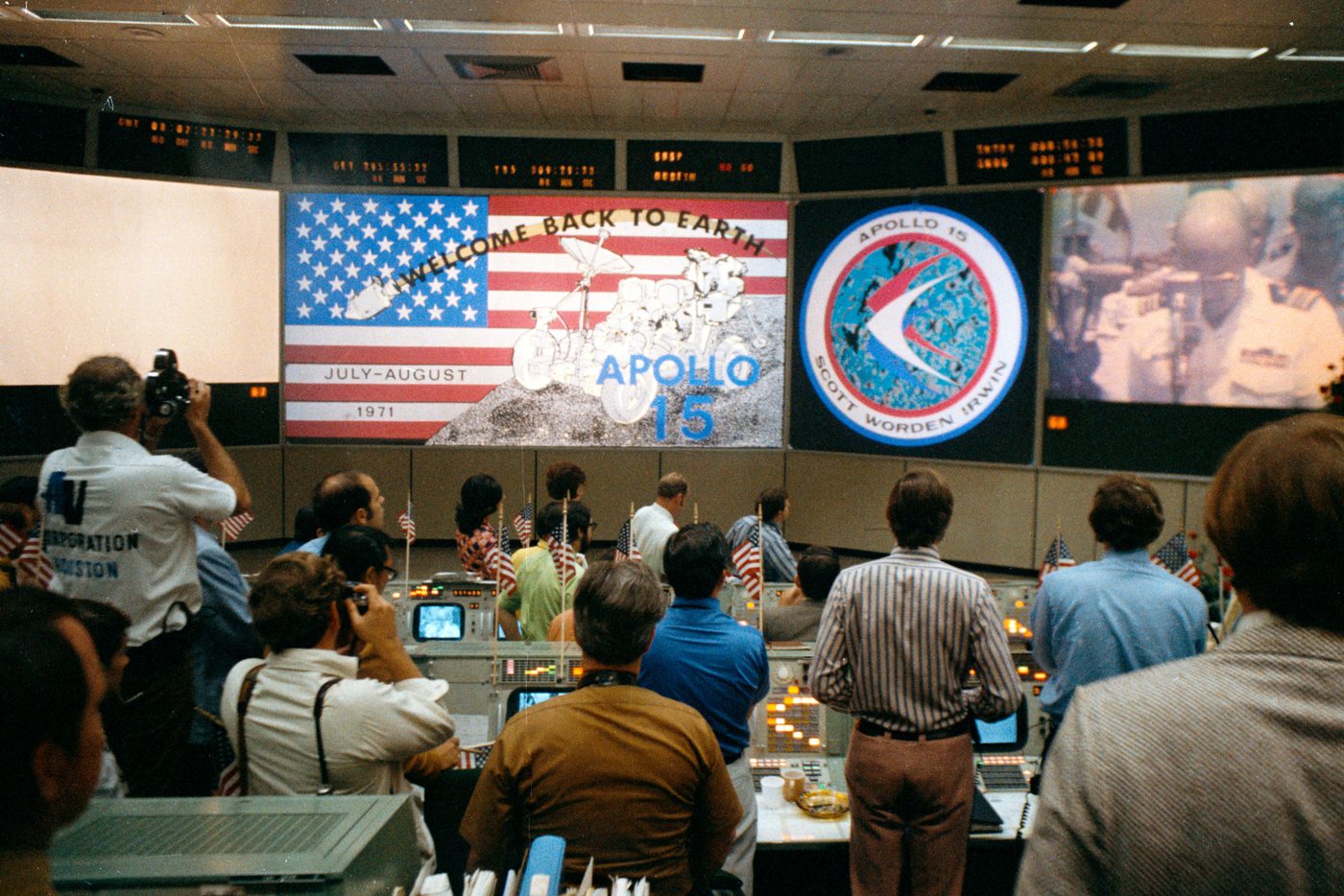 Figure 3 — Mission Control at the conclusion of an Apollo lunar landing. On the ground, flight controllers could read the AGC's program alarms; in the air, the computer's restart protection meant s…