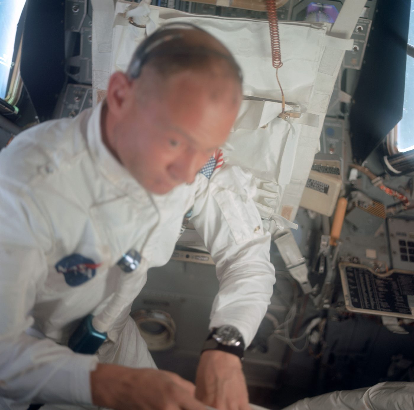 Figure 2 — Buzz Aldrin inside the Lunar Module during Apollo 11; the DSKY and the LM control panels are the crew's window into the guidance computer. Photo: File:AS11-36-5396 — Astronaut Edwin E. A…