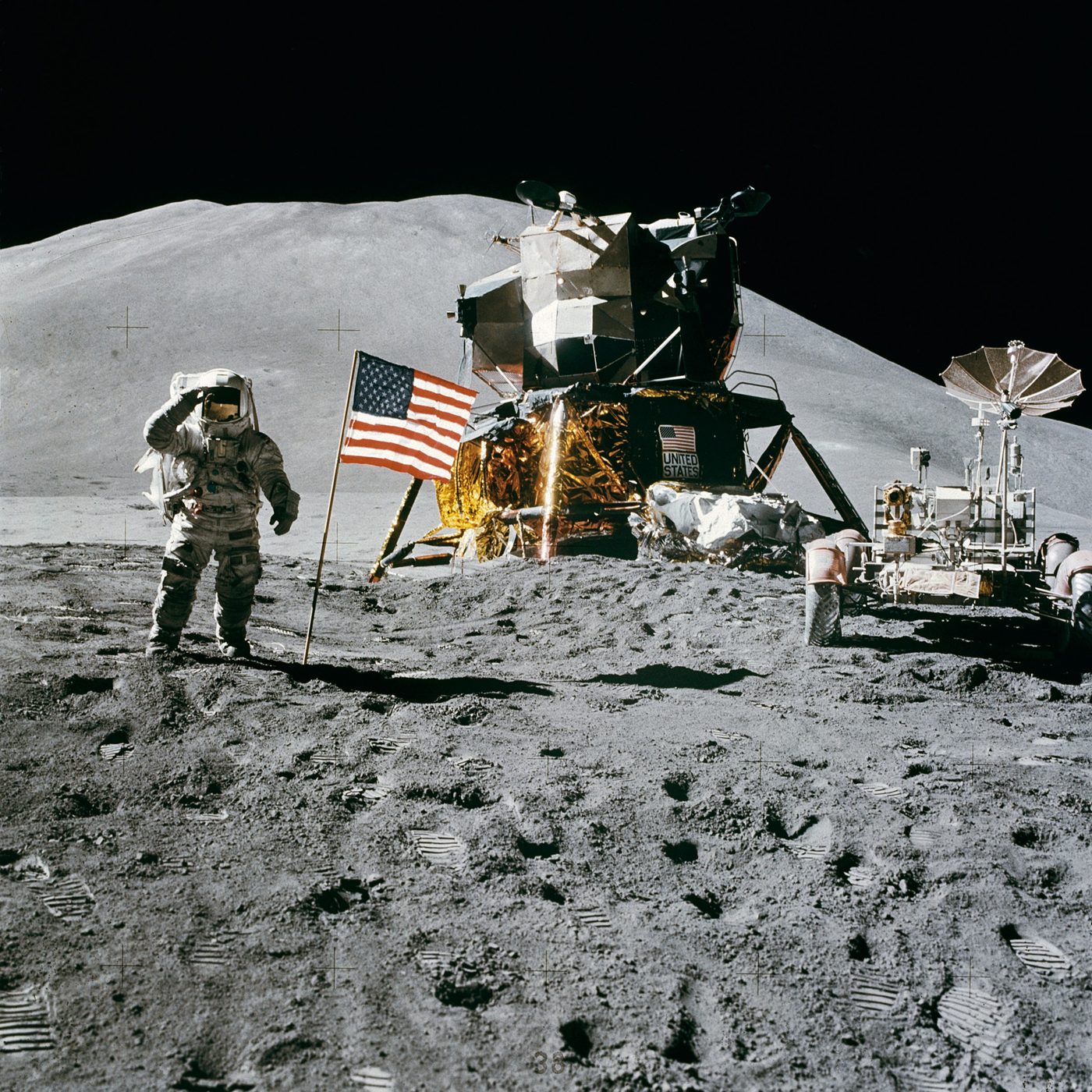 Figure 5 — Apollo 15's Lunar Module Falcon at Hadley, flanked by the Lunar Roving Vehicle and astronaut James Irwin, against the slopes of the Apennine mountains — a landing site reachable only wit…