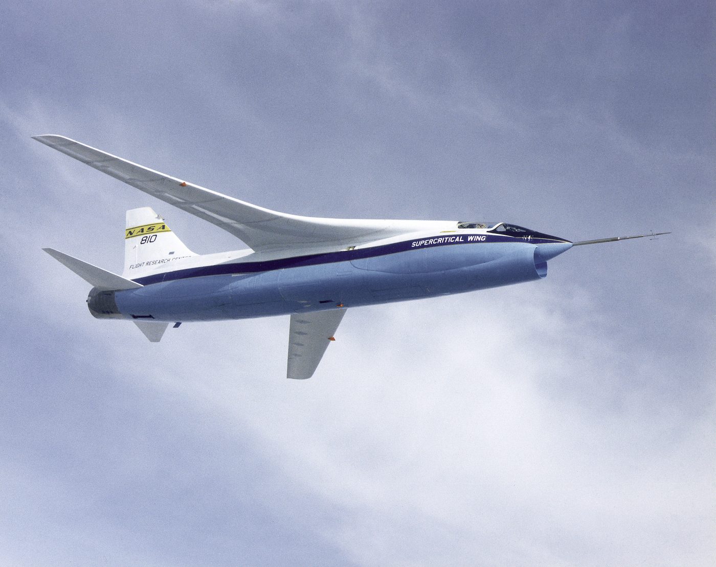 Figure 3 — A NASA F-8 Crusader research aircraft. A sibling F-8C became NASA's Digital Fly-By-Wire testbed in 1972, flying on a reprogrammed Apollo Guidance Computer with no mechanical backup — the…