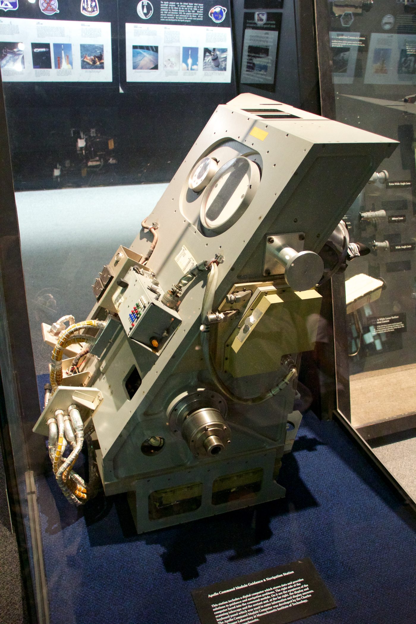 Figure 4 — The Command Module guidance-and-navigation station, where the inertial, optical, and computing elements came together. The eyepieces of the sextant and scanning telescope are at center; …