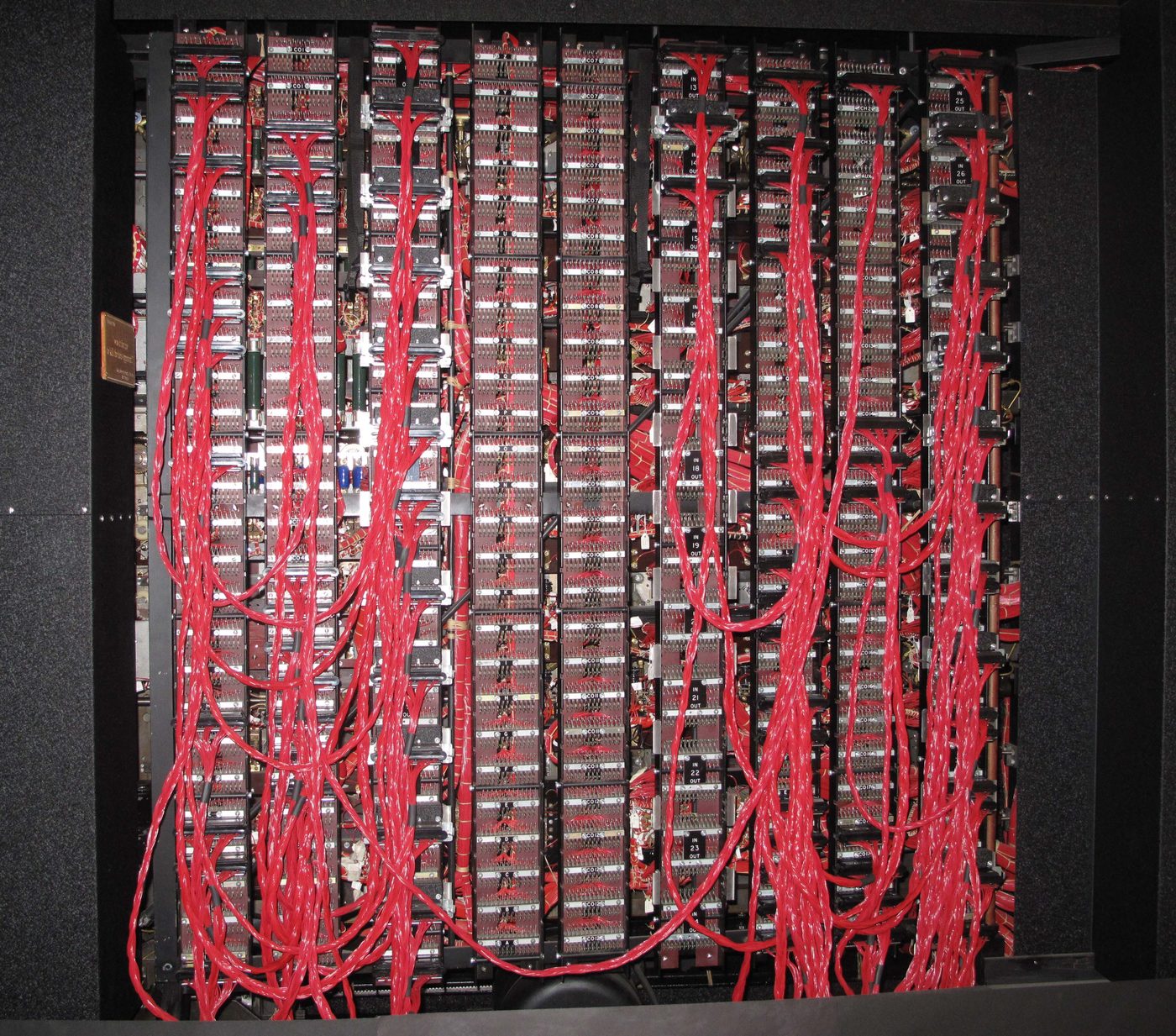 Figure 4 — The rear of a rebuilt Bombe, a thicket of plug cables and the wiring that carried the menu and Welchman's diagonal-board connections between scramblers. File:Back of rebuilt Bombe showin…