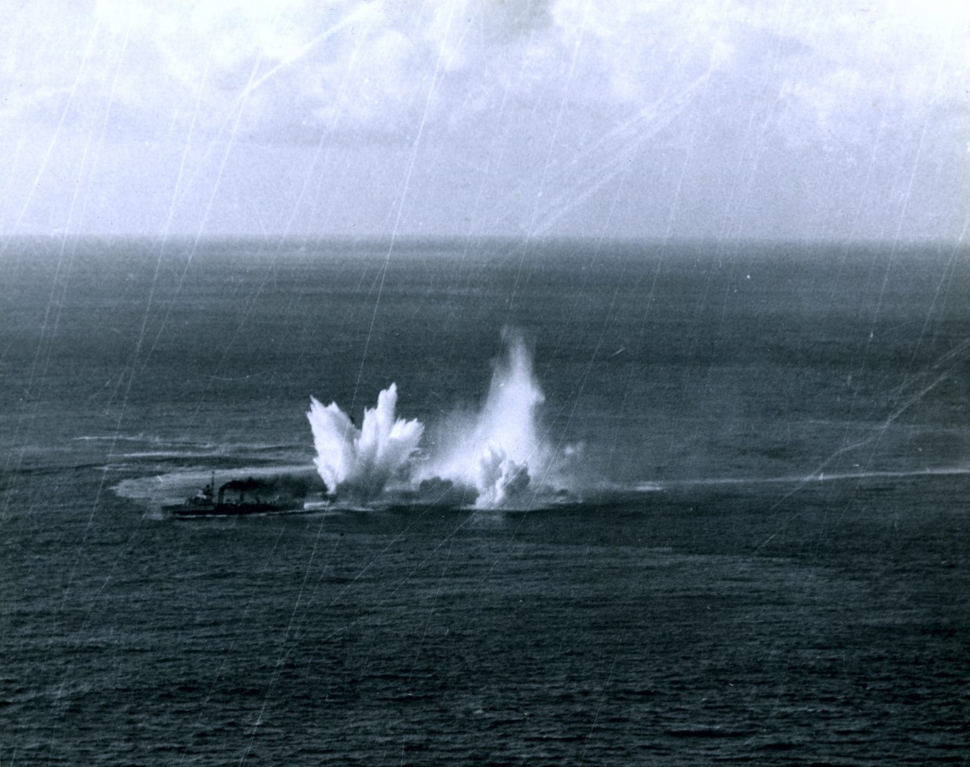 Figure 3 — A destroyer's depth-charge attack throws up a wall of water; HMS Wishart attacking U-761 in the Strait of Gibraltar, 24 February 1944. Photo: File:HMS Wishart (I67) makes a depth charge …